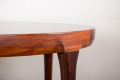 Danish extendable dining table in rosewood by Ib Kofod-Larsen for Faarup 1960.