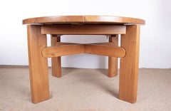 Large-diameter vintage solid elm extendable table by Maison Regain, 1960.