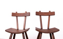 Pair of Brutalist elm chairs in the style of Jean Touret - Artisans de Marolles.
