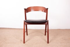 Danish teak and Skai armchair by Henning Kjaernulf for Korup Stolefabrik, 1960.