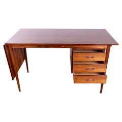 Danish extendable desk in Rosewood and Brass, model OS 51, by Arne Vodder 1960.