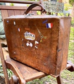 Valise française ancienne en cuir cousue à la main