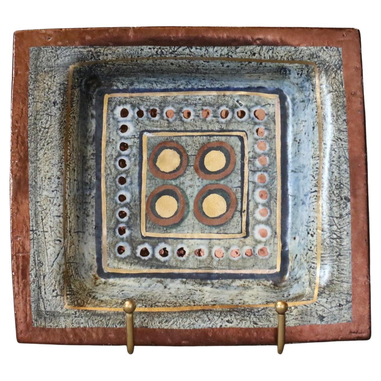 French Ceramic Vide-Poche or decorative plate by Georges Pelletier, 1970s

Born in Belgium in 1938, Georges Pelletier is famous ceramist installed in France. During his apprenticeship period, while he's only 16 years old, he joined the Poteries