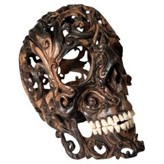 Carved Wood Skull Sculpture