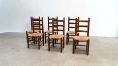 Set of six French dining chairs by Charles Dudouyt