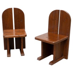 Set of two sculptural dining chairs