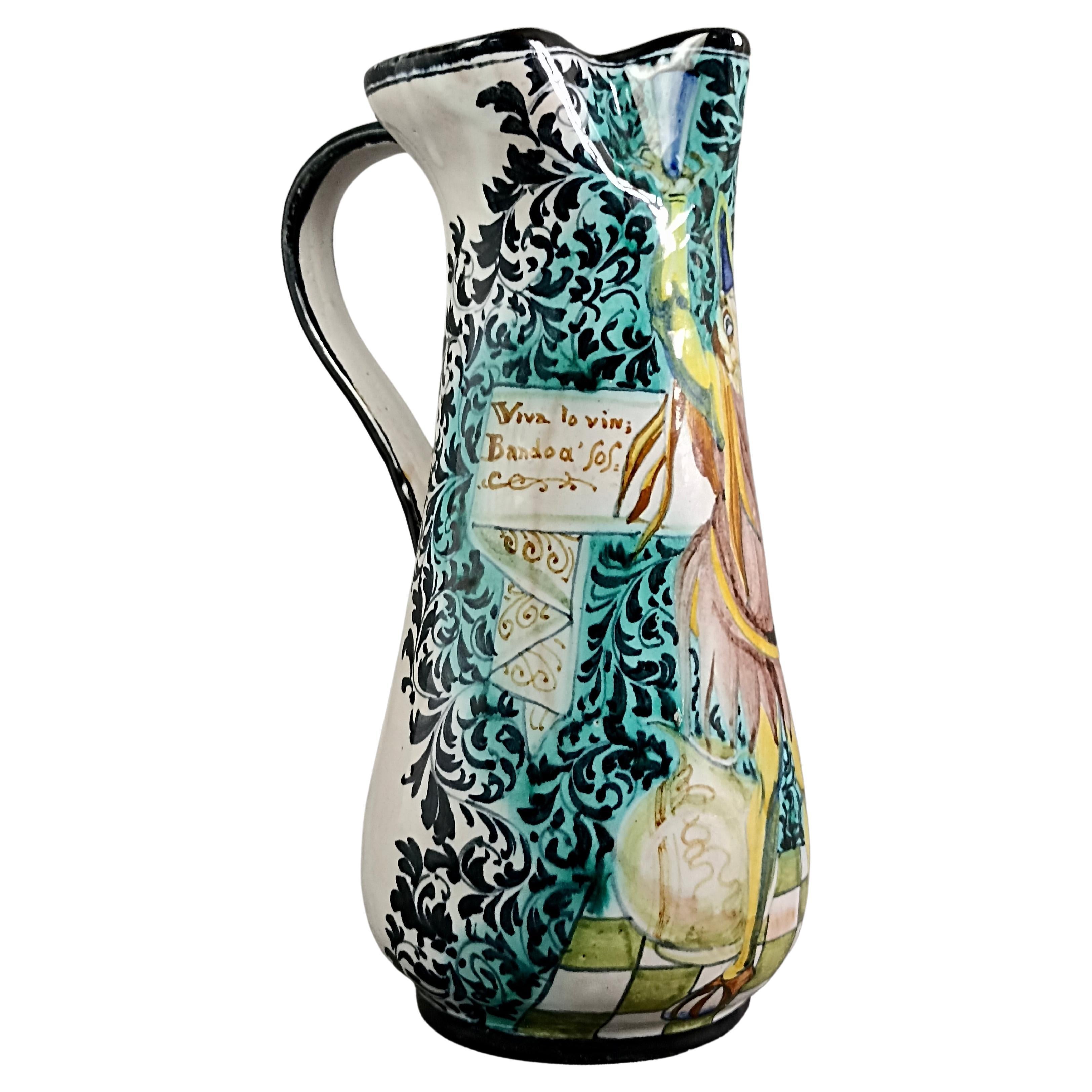 Elegant Italian ceramic wine jug from the first half of the twentieth century, made and entirely decorated by hand. 
On the jug is the mark of the artistic ceramics manufactory 