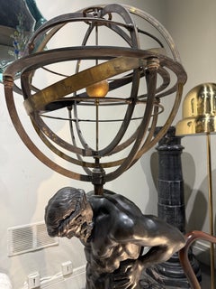 Bronze sculpture of Atlas with sphere