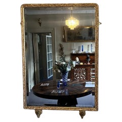 A 20th C Gilt Gesso Wall Mirror Frame with later glass and double candle arms