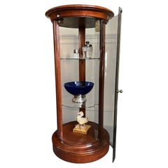 Mahogany cylindrical vitrine, curio display cabinet