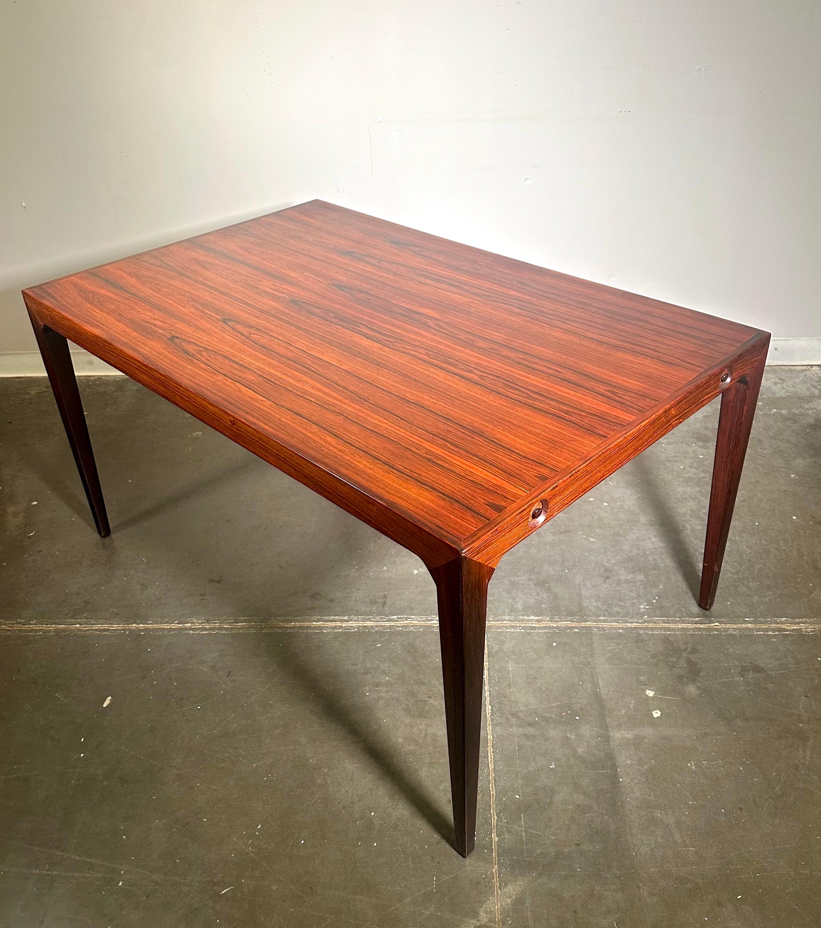 Danish Rosewood expandable table.

Gorgeous dining table that has stunning wood grain and opens to fit a large party.

Semi refinished and in great vintage shape.

Dimensions:
72 - 114” L  x 46d x 28 h