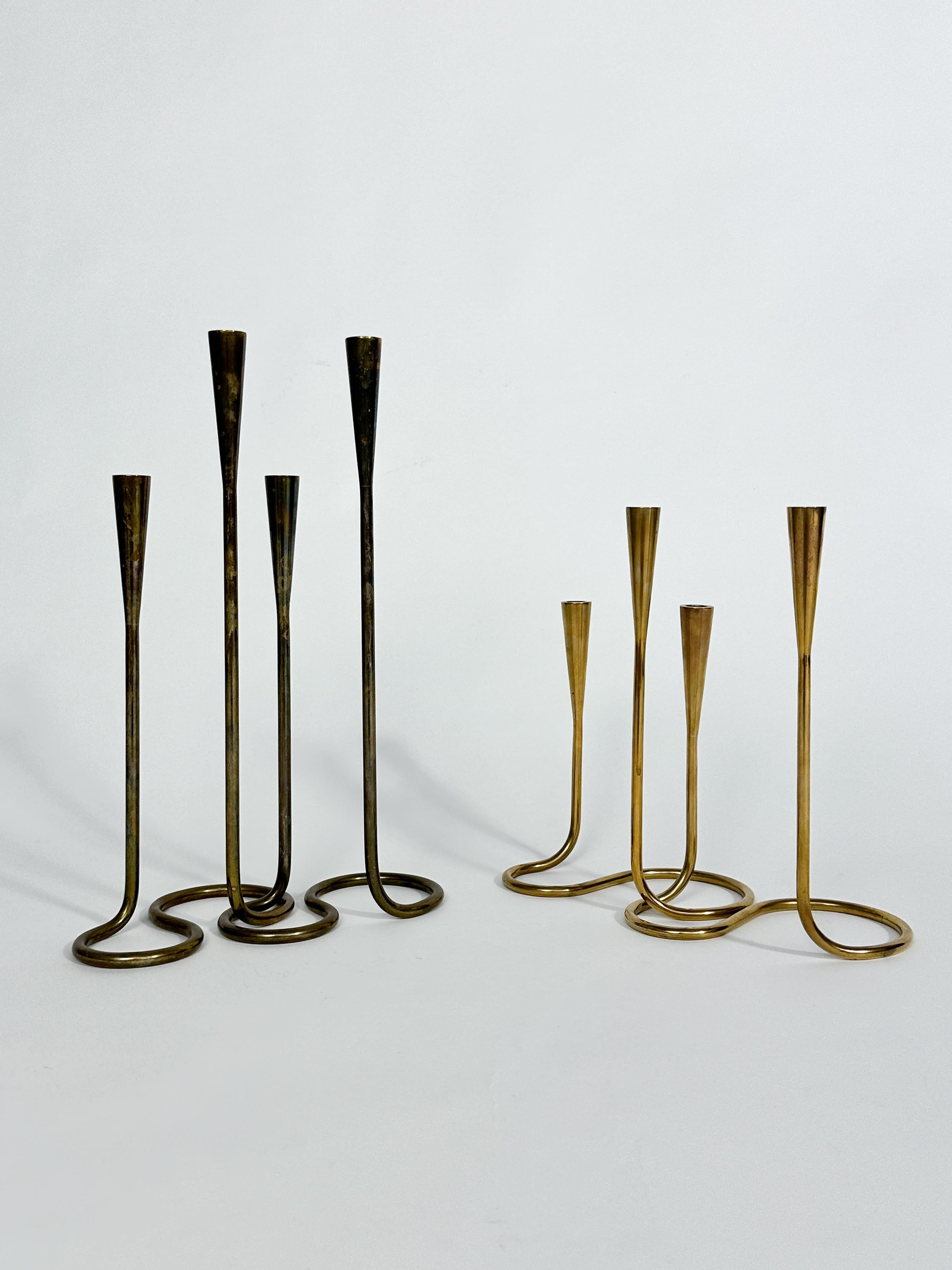 Danese Set di quattro portacandele in ottone serpentino Illums Bolighus Danimarca 1950s in vendita
