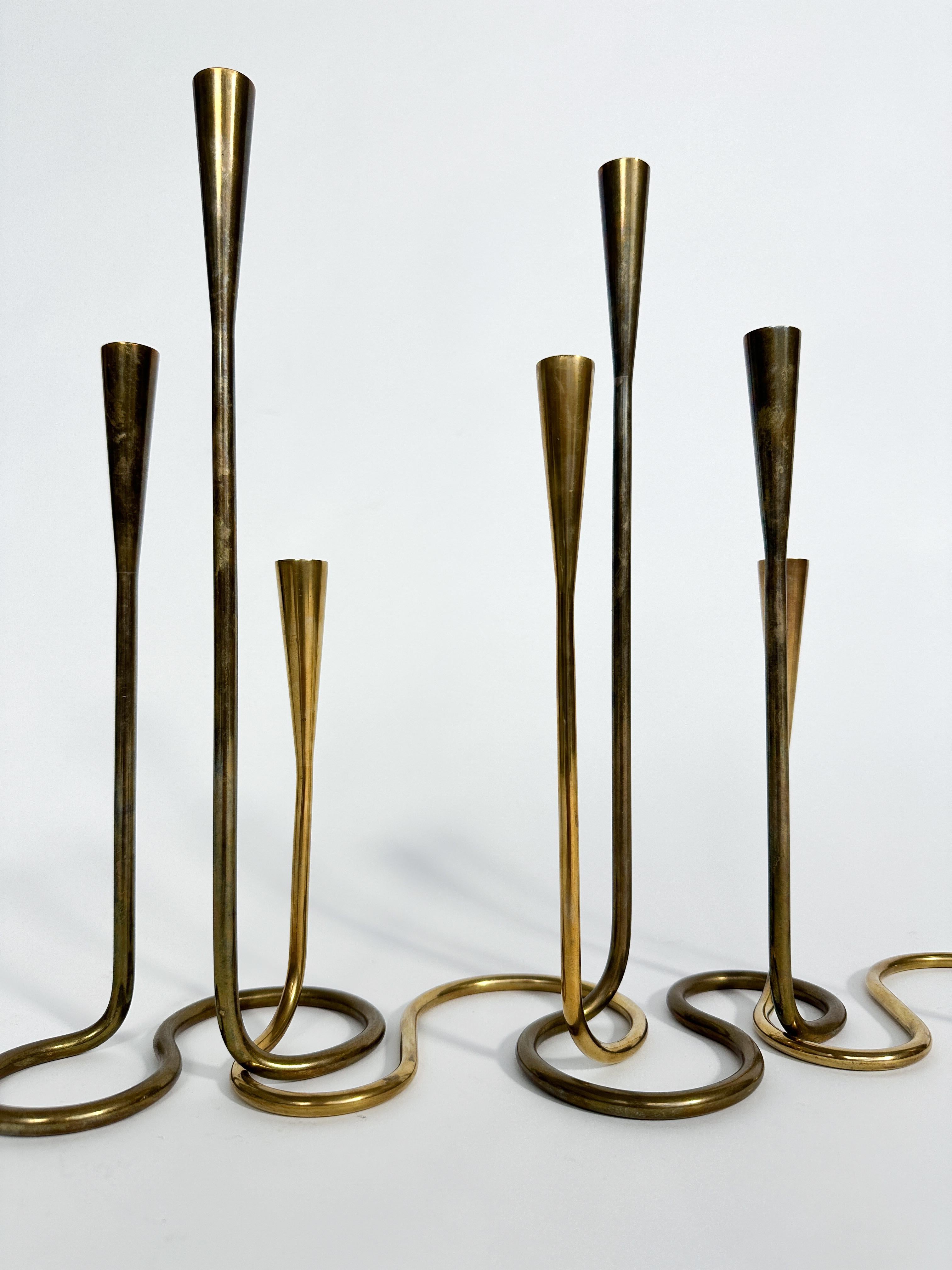 Set di quattro portacandele in ottone serpentino Illums Bolighus Danimarca 1950s in vendita 1