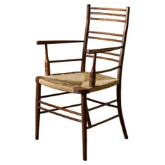 Poltrona in rovere inglese stile Arts & Crafts con seduta in giunco