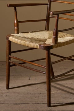 Poltrona in rovere inglese stile Arts & Crafts con seduta in giunco