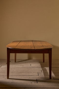 19th century French oak and fruitwood oval dining table