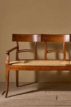 19th century cherrywood and rush seated hall bench