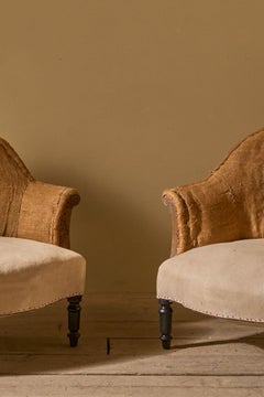 Paire de fauteuils baquets Napoléon III en toile de jute