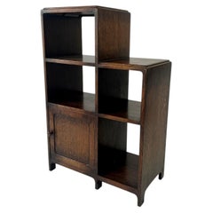 Modernist art deco bookcase / shelving unit in oak. English, c.1930