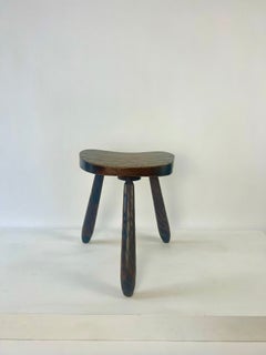 Vintage rustic brutalist carved wood tripod stool. France, c.1930-50