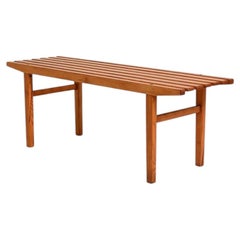 Scandinavian bench made of solid pine slats