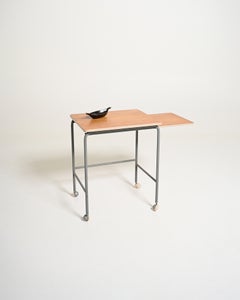 Vintage Swedish coffee table with a pull-out top