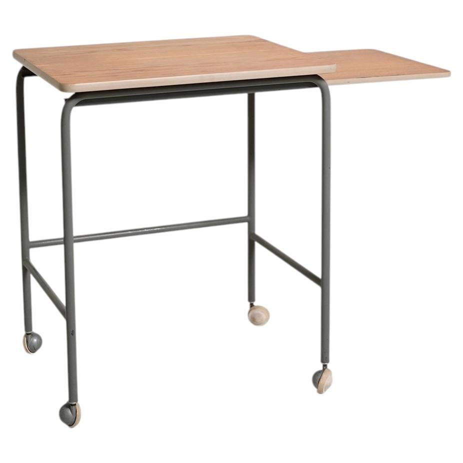 Vintage Swedish coffee table with a pull-out top For Sale