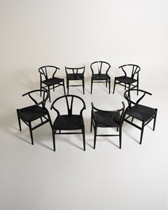 Set of 8 “Wishbone Chair” “CH24” chairs by Hans J. Wegner, from the 1990s