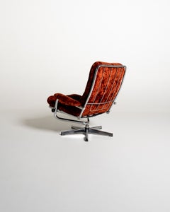 Swedish swivel armchair in velvet and steel, 1970s