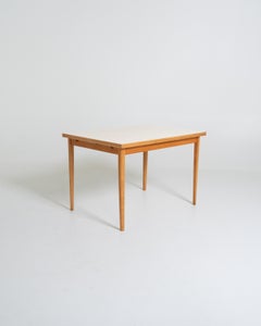 Light-colored laminate dining table, Sweden, 1950s–1960s