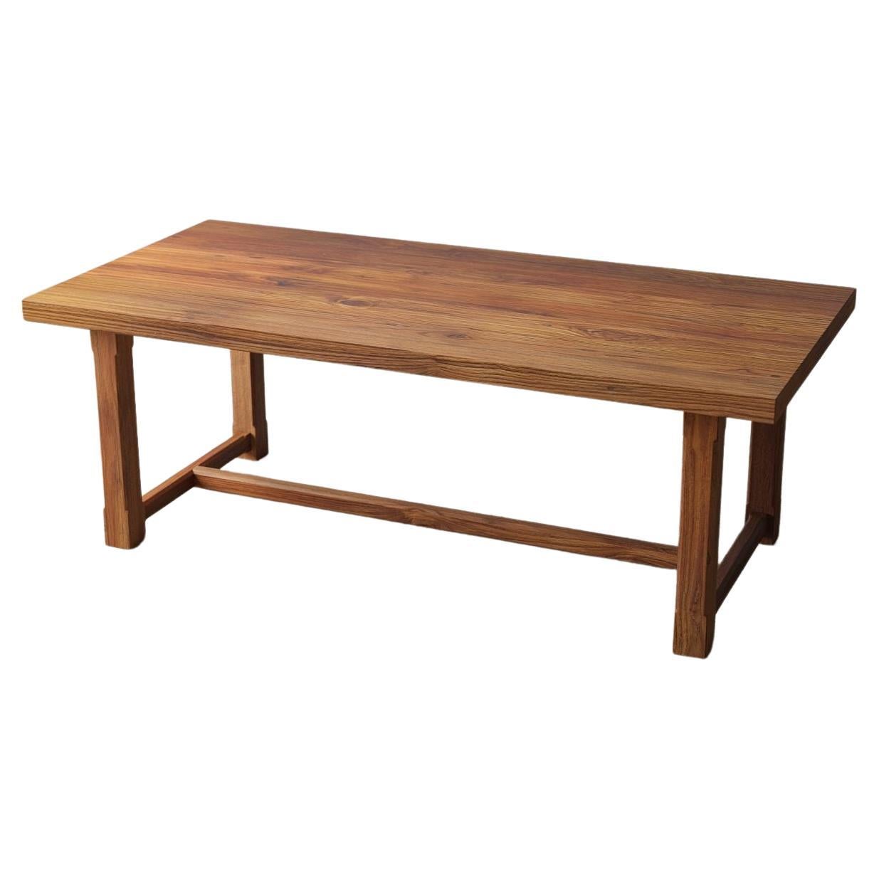 Solid Teak Dining Table in a Smooth Natural Finish For Sale