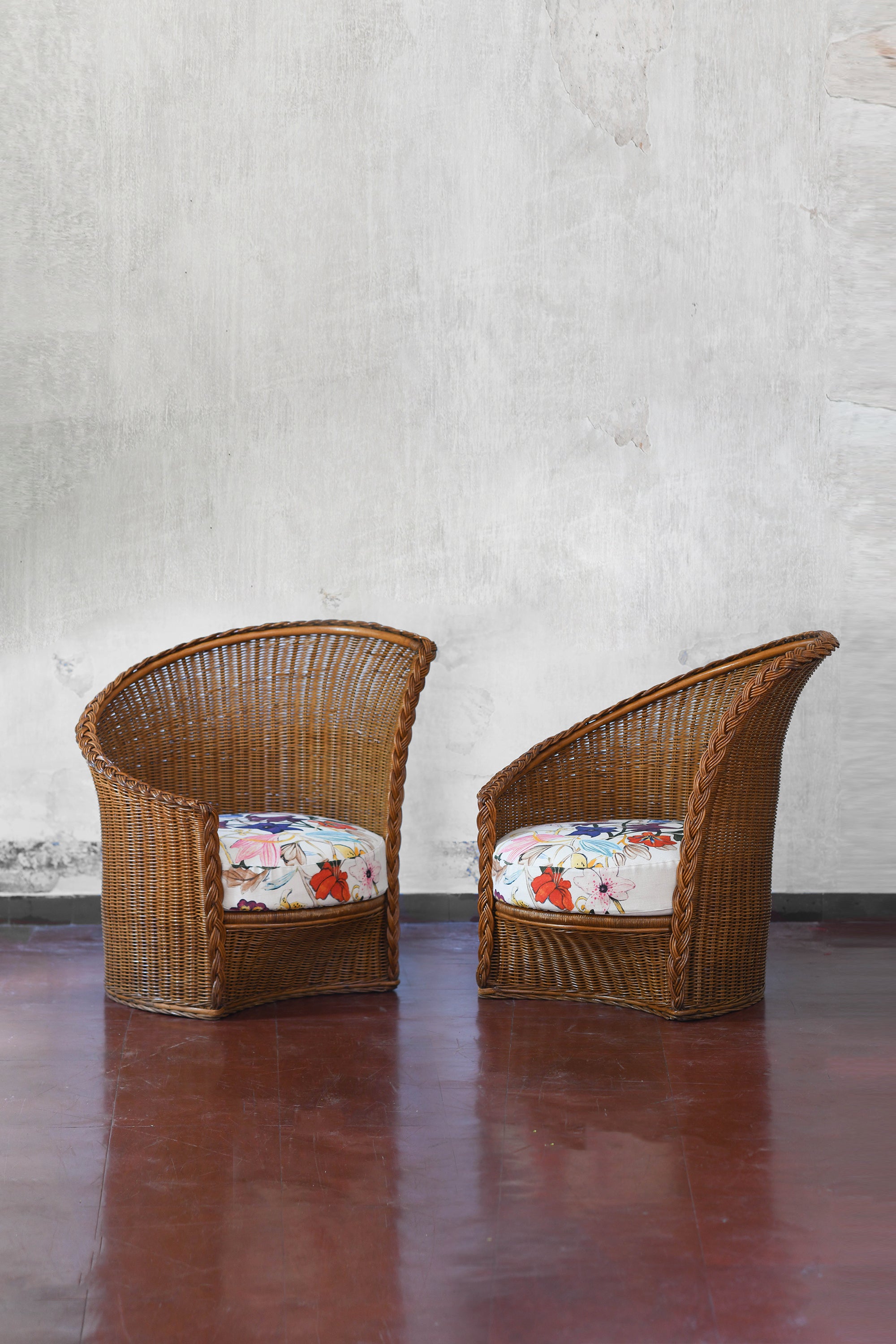 Pair of rattan and wicker armchairs in dark finish, Italy 1980s
