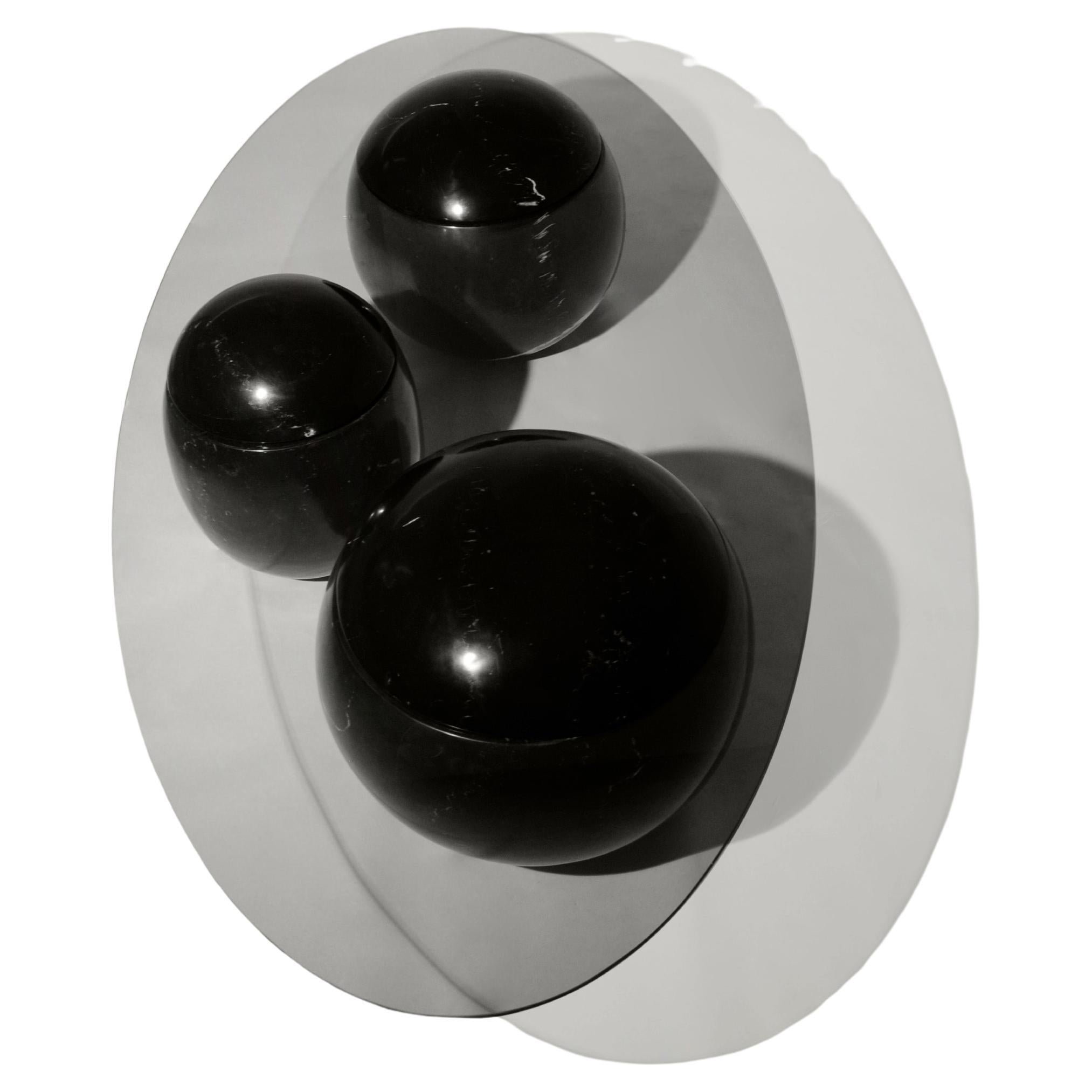 Ovni Uovo Skulpturaler Couchtisch aus schwarzem Marmorglas