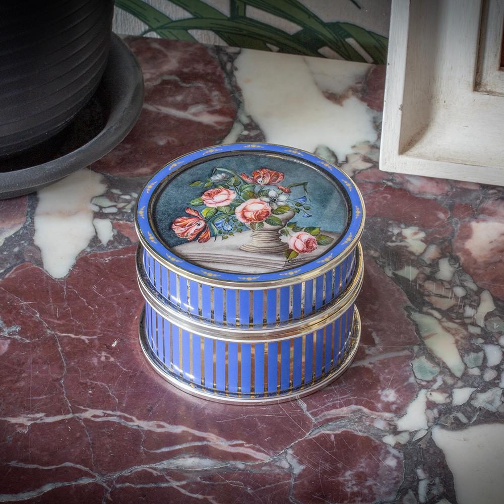 ENAMEL AND SILVER GILT TABLE SNUFF

From our collectables category, we are delighted to offer this incredible quality Italian Mid-Century Modern Silver and Enamel Circular Box. The Silver and Enamel Box of circular drum form decorated extensively