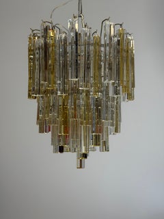 Venetian chandelier made of colorless and gold Murano glass, Venini Triedi model