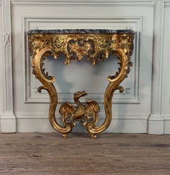 Regency console with dragon, carved and gilded wood, Paris around 1720