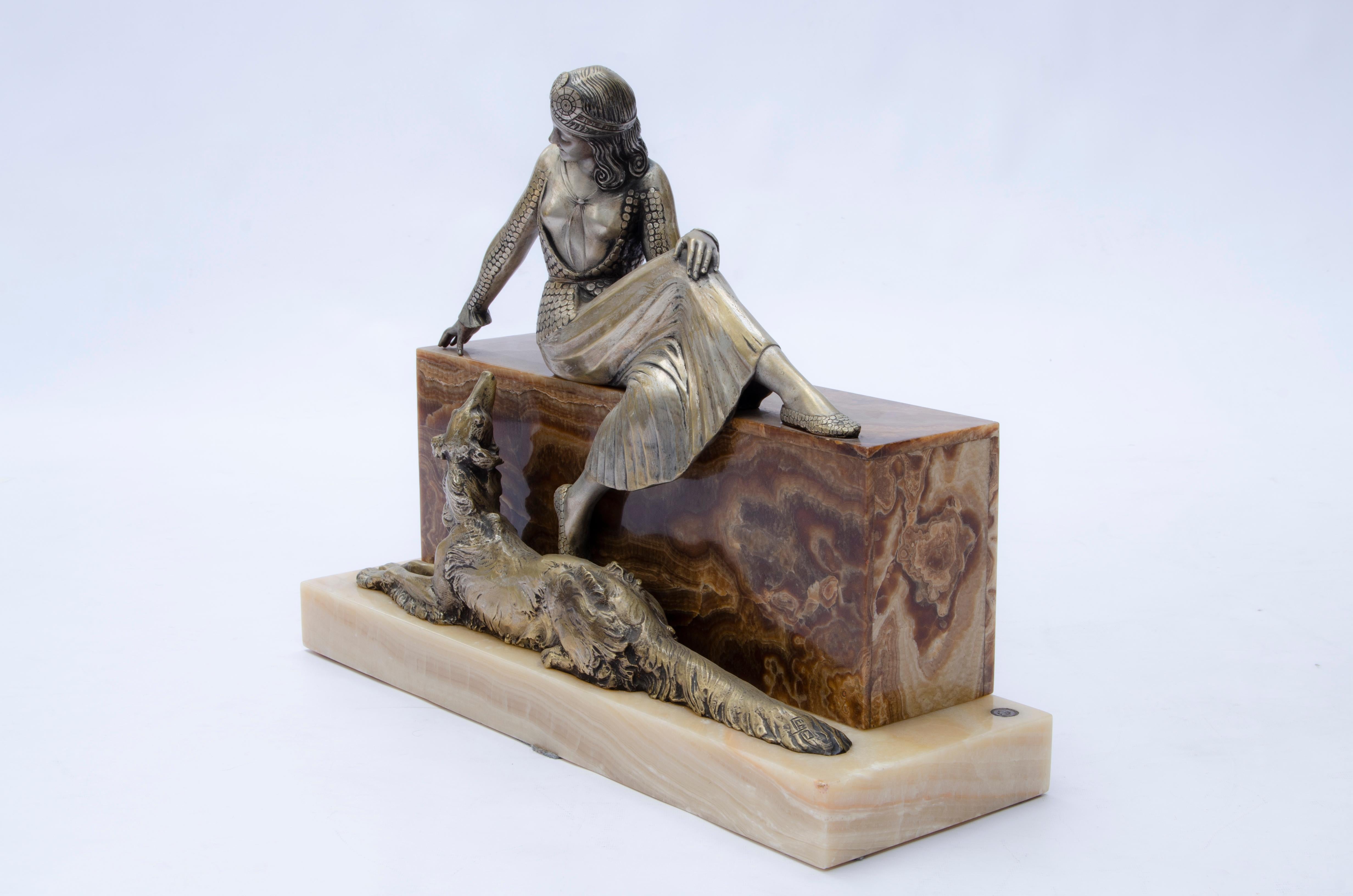 Art Deco Sculpture “Woman seated with greyhound” by Armand Lémo For Sale