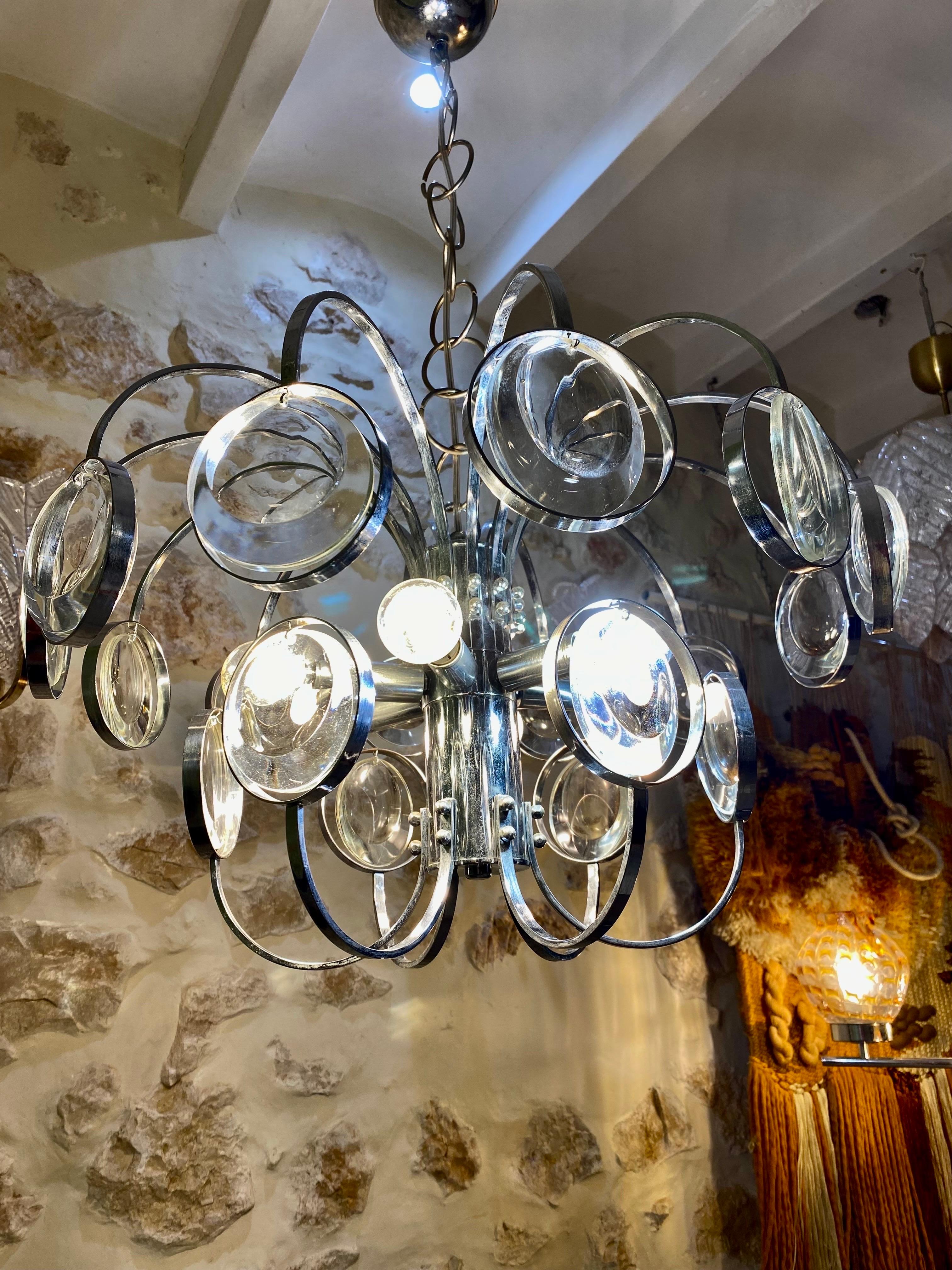 Exceptional Oscar Torlasco chandelier with large glass Murano with chrome structure. The Design and the quality of the glass make this piece the best of the Italian Design. This unique Oscar Torlasco in glass murano are exceptional.

This Pieces of