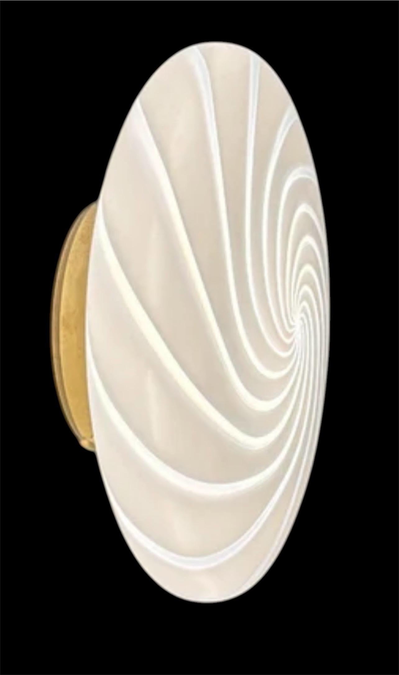 Murano Glass Ceiling or Wall Lights by VM-Vetri, Italy, Late 1970s

These are white heleptic Murano glass ceiling or wall lights with a white painted metal bracket, from the production of VM 'Vetri Murano', Italy, in the late 1970s. The quality of