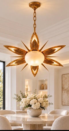 Lustre Art déco français en bronze doré, avec verres d'origine en forme d'étoile et de rayons de soleil, 1935