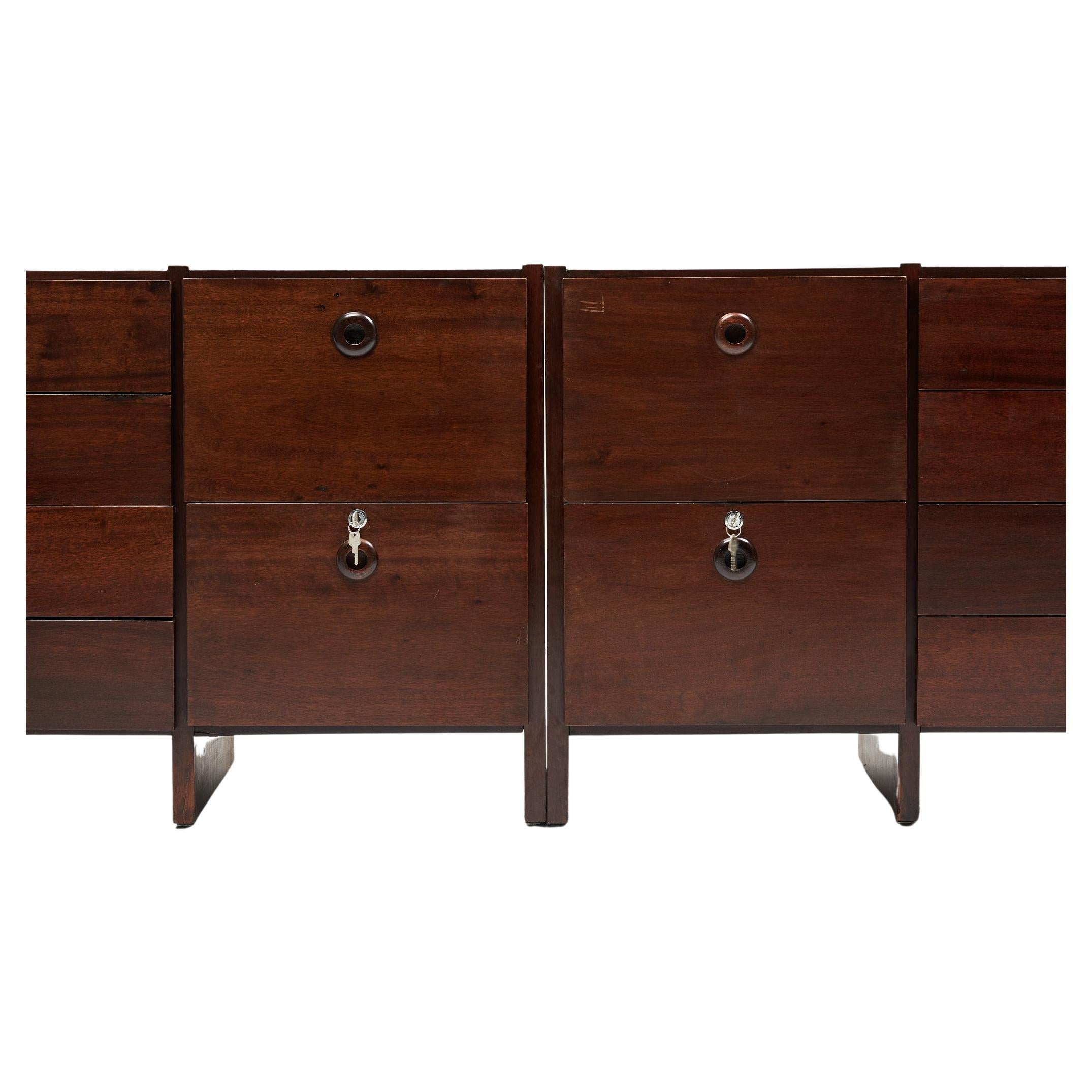 Available immediately, these Brazilian Modern file cabinet pair in wood by Geraldo de Barros for Hobjeto made in 1971 is awesome.

These handsome Mid-Century Modern pair is not only rare but convenient. Each one is made of Jacaranda leaf and