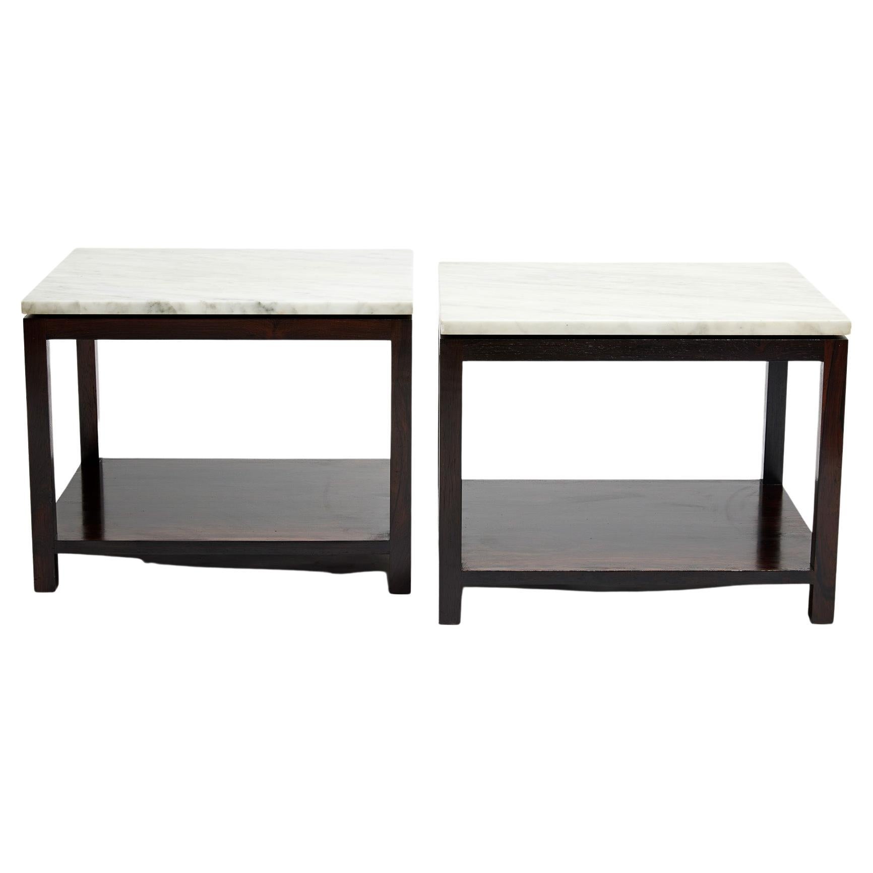 Available today, this Mid-Century Modern Side Table Pair made in Hardwood & Marble, in the sixties is stunning!

This very elegant pair of side tables are made of Brazilian Rosewood, as known as Jacaranda Marble. The shape is rectangular with two