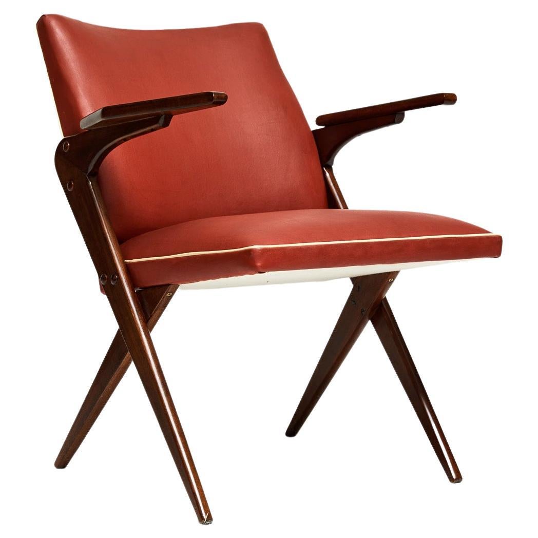 Available right now, this midcentury Armchair in Wood & Red Synthetic Leather by Jose Zanine Caldas, in the fifty’s decade is gorgeous!

This Brazilian Modern rarity consists of a wood structure with re-upholstered red synthetic leather. This