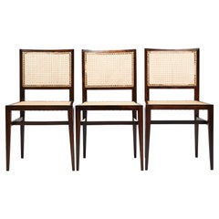 Drei moderne Stühle aus Hartholz und Schilfrohr von Joaquim Tenreiro aus der Mitte des Jahrhunderts, Brasilien