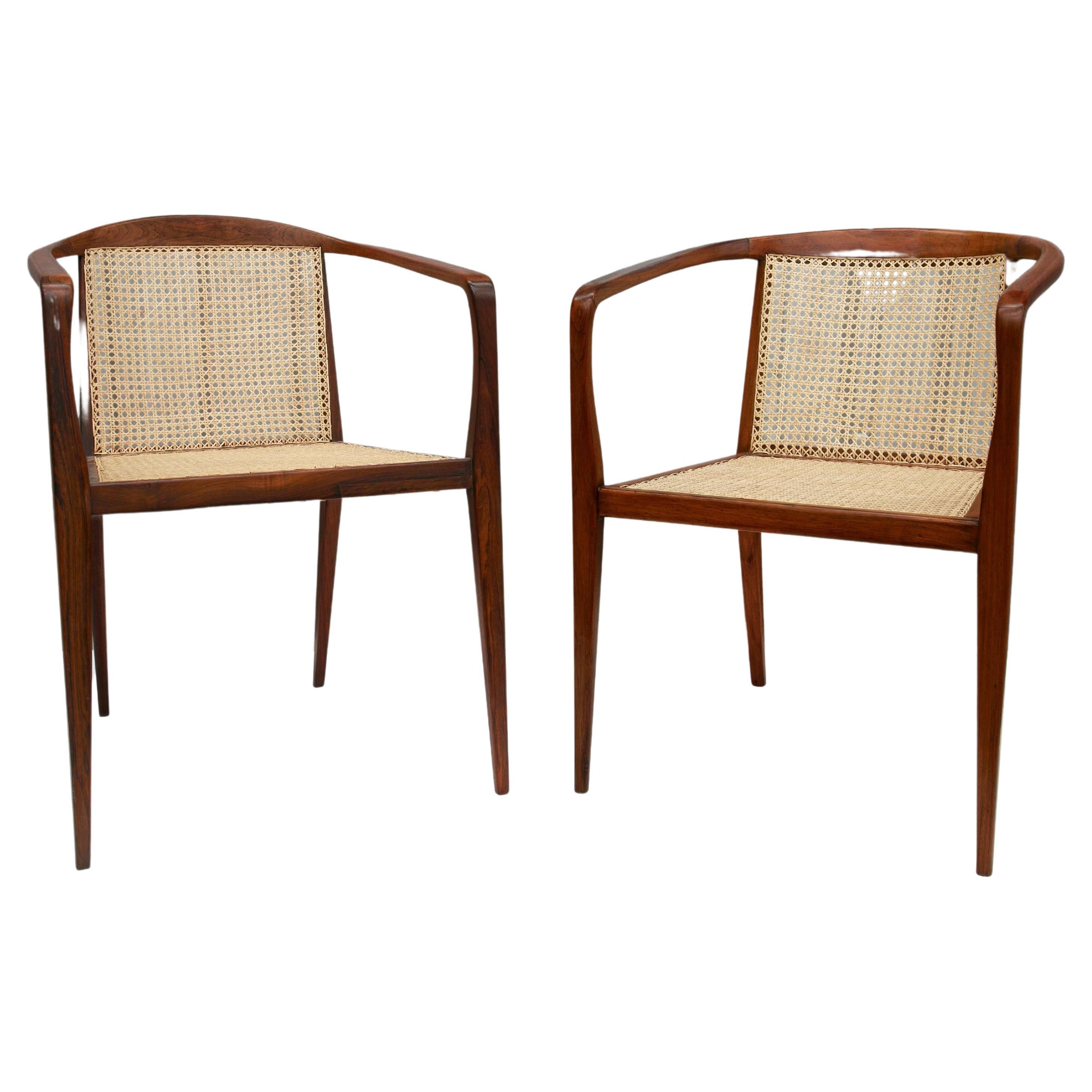 Available today, these fabulous Brazilian Modern Armchairs in Hardwood & Cane designed by John Graz in the fifties are THE FIND of the year.

The delicate set is made of Brazilian rosewood, known as Jacaranda and consists of four toothpick legs, a