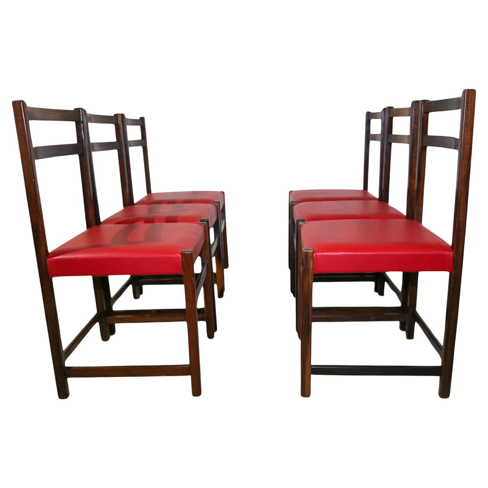 Available TODAY in NYC including FREE DOMESTIC SHIPPING, these Set of Six Chairs in Rosewood & Red Leather by Celina Decoracoes, 1960s are nothing less than gorgeous!

The wood has been refurbished and is in excellent condition. The red leather is