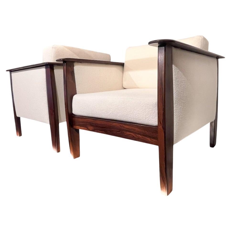 Available today in NYC, including free domestic shipping, this Mid-Century Modern Pair of Armchairs in Hardwood & Bouclé designed by Fatima is nothing less than a beauty!

Introducing a pair of cozy armchairs expertly crafted by Fatima during the