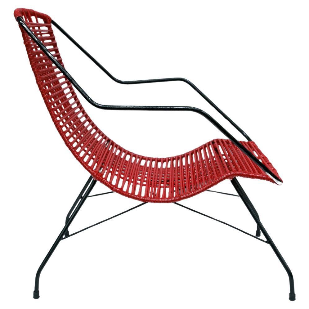 Disponibile oggi, con spedizione nazionale nell'area metropolitana di New York inclusa, questa poltrona moderna del Mid Century in corda rossa e ferro di Forma, degli anni '50, è a dir poco stupenda!  

Questa poltrona presenta una struttura in