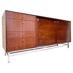 Refinished Mid Century Modern Twelf Drawer Dresser By John Stuart. Circa 1960s.