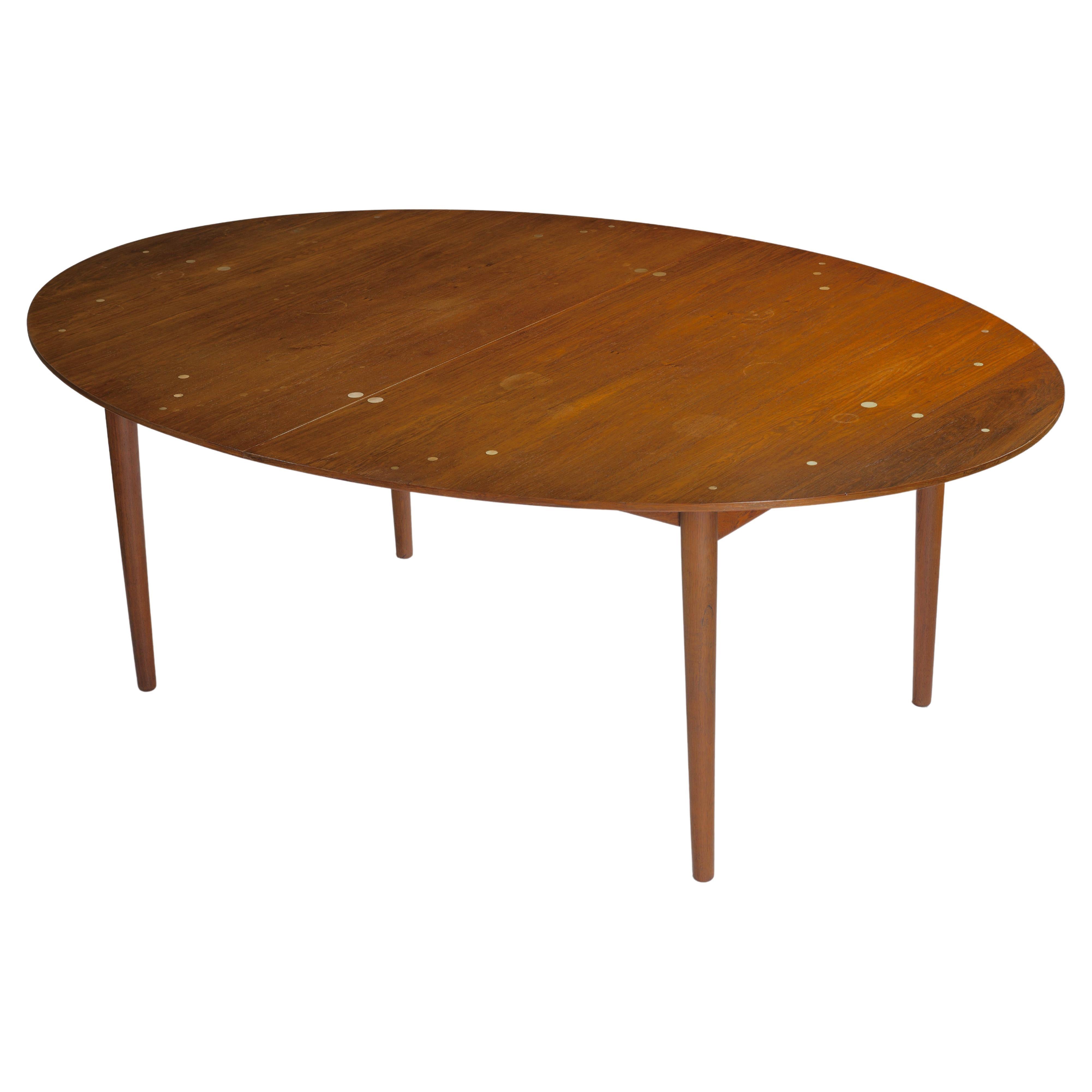 Mid-Century dining table designed by Finn Juhl for Niels Vodder. Made in Denmark, 1948. 

The 'Judas' table deserves to be seen as the embodiment of fundamental Mid-Century Danish design principles. It shows exceptional craftsmanship and attention